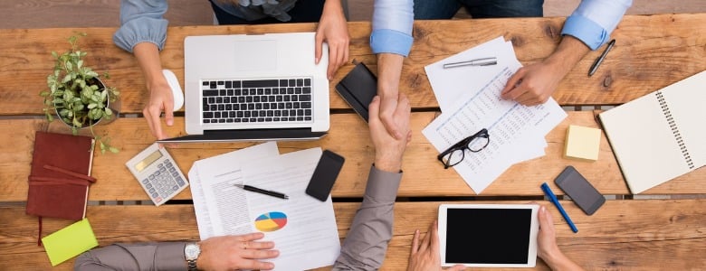 business-handshake-at-work-picture-id505473672