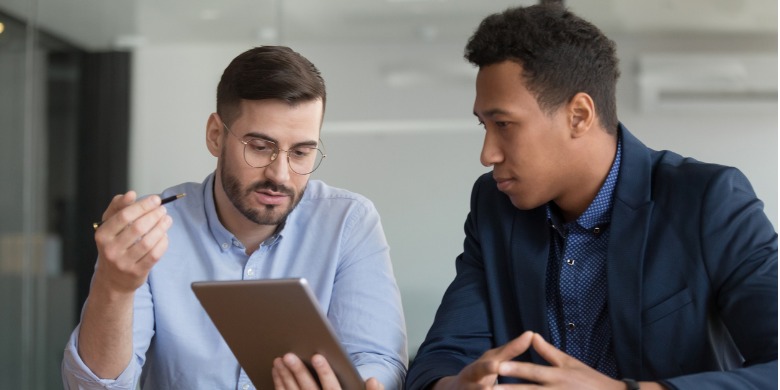 diverse-businessmen-working-on-startup-project-using-electronic-picture-id1174262839 (1)